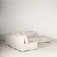 Vista posterior de Sala modular color beige, fabricada de 4 módulos de 1x1 (1 esquinero, dos módulos con respaldo y 1 otomán). Ideal para tu sala de casa de playa. Encuéntrala en Prisma, mueblería en Cancún, Playa del Carmen y Tulum.